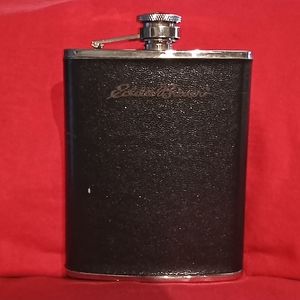 Eddie Bauer Stainless Steel Hip Flask Leather Wrapped. 6 Ounce Curved Flask.
